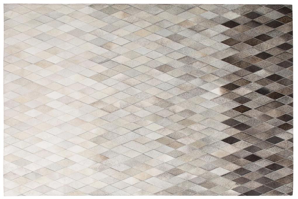 Kožený koberec 140 x 200 cm béžová/sivá MALDAN Beliani