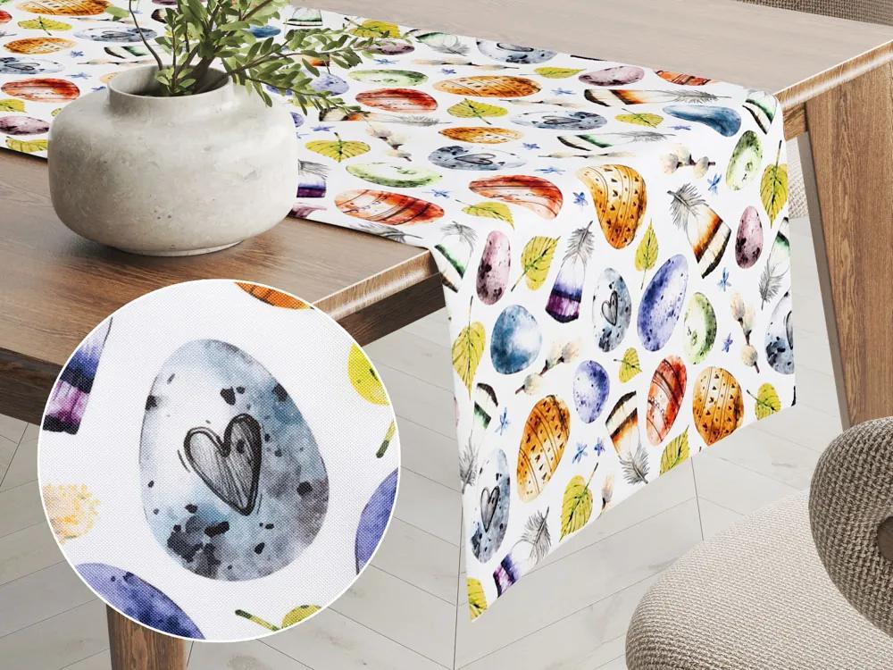 Biante Veľkonočný teflónový behúň na stôl TF-075 Farebné kraslice a pierka na bielom 45x160 cm