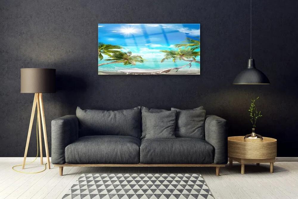 Skleneny obraz Tropické palmy hamaka pláž 125x50 cm