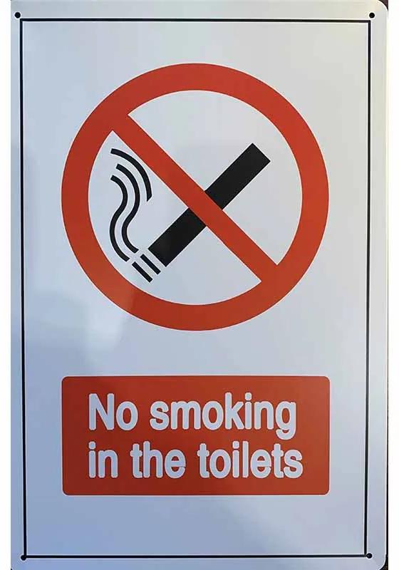 Ceduľa No smoking in the toilets