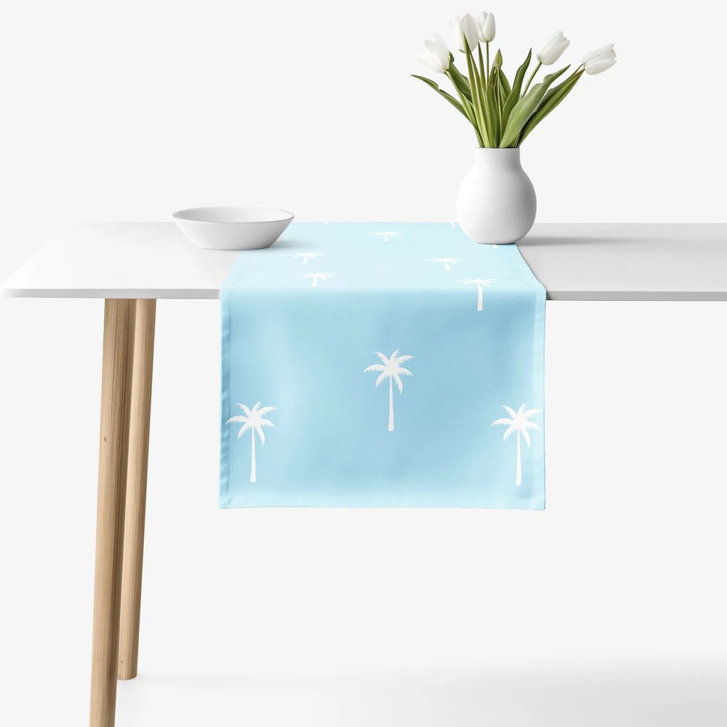 Goldea behúň na stôl 100% bavlnené plátno - palmy na pastelovo modrej 50x120 cm