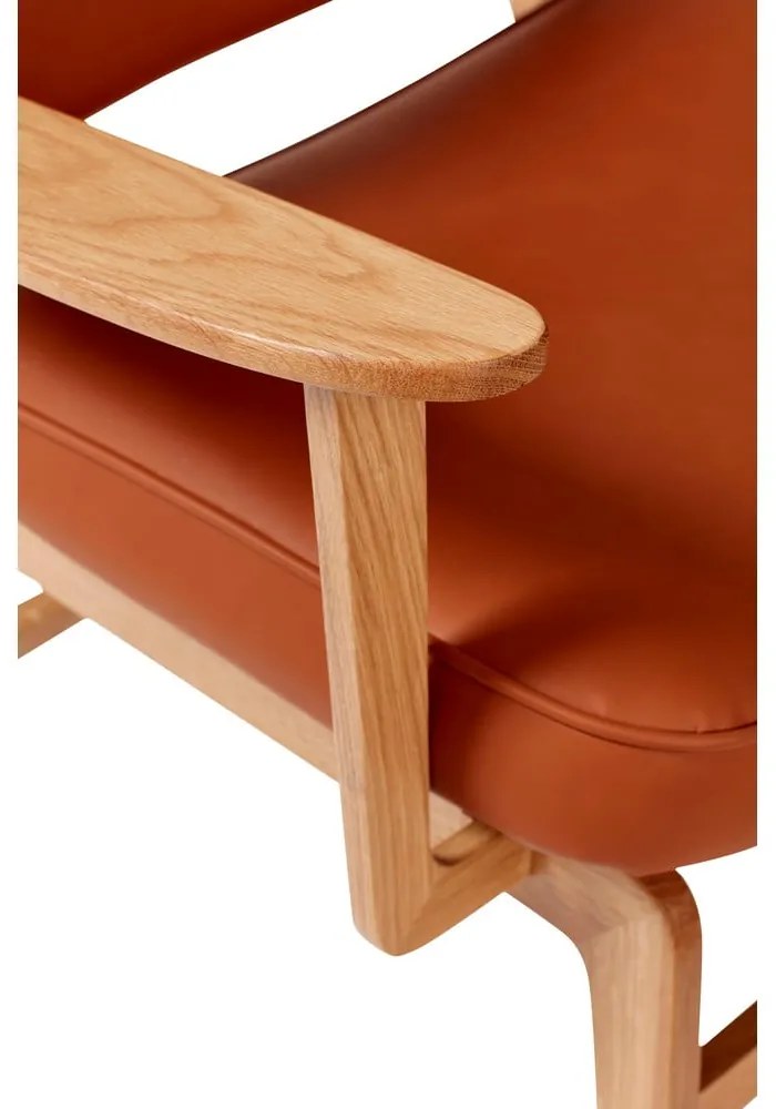 Oranžové kreslo z imitácie kože Hübsch Haze