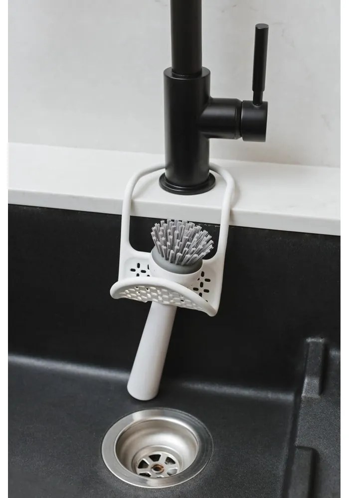 Závesný plastový držiak na hubku Sling – Umbra