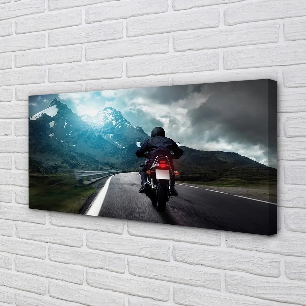 Obraz canvas Motocykla horskej ceste muž neba 120x60 cm