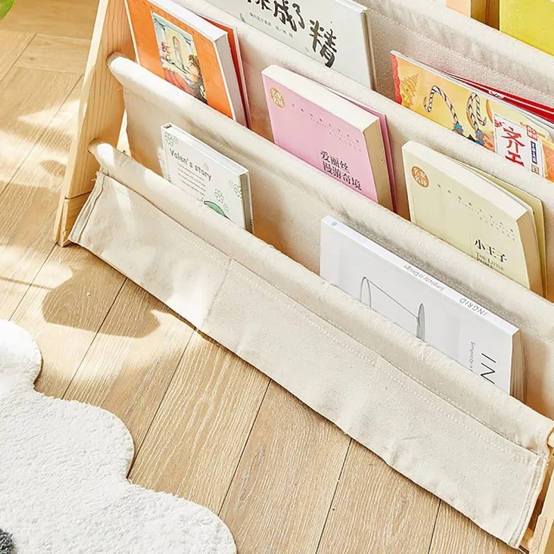 Detský regál na knihy s látkovými poličkami