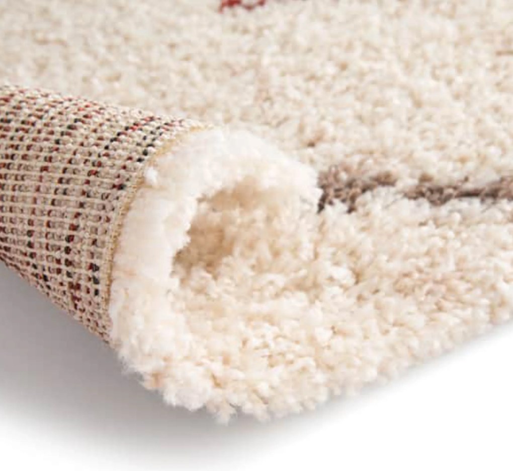 DY Krémový shaggy koberec s abstraktným vzorom Santo 04 Rozmer: 80x150 cm