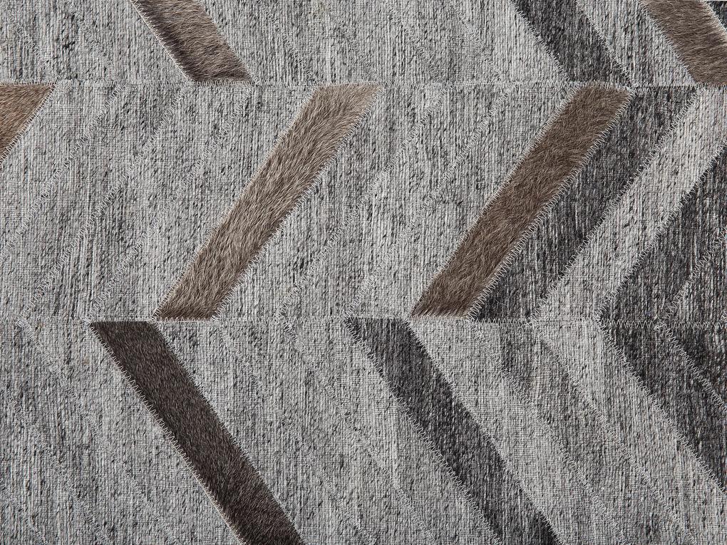 Kožený koberec 140 x 200 cm sivý ARKUM Beliani