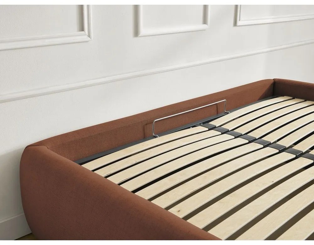 Oranžová čalúnená dvojlôžková posteľ s úložným priestorom/bez čela s roštom 180x200 cm Inera – Bobochic Paris