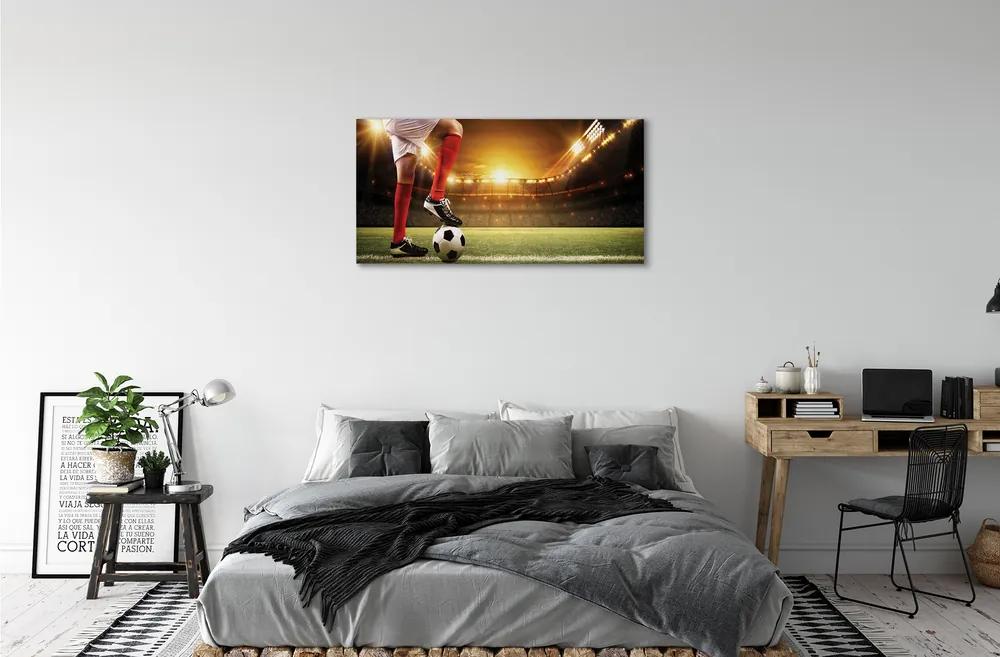 Obraz canvas Futbalovom štadióne nohy 140x70 cm