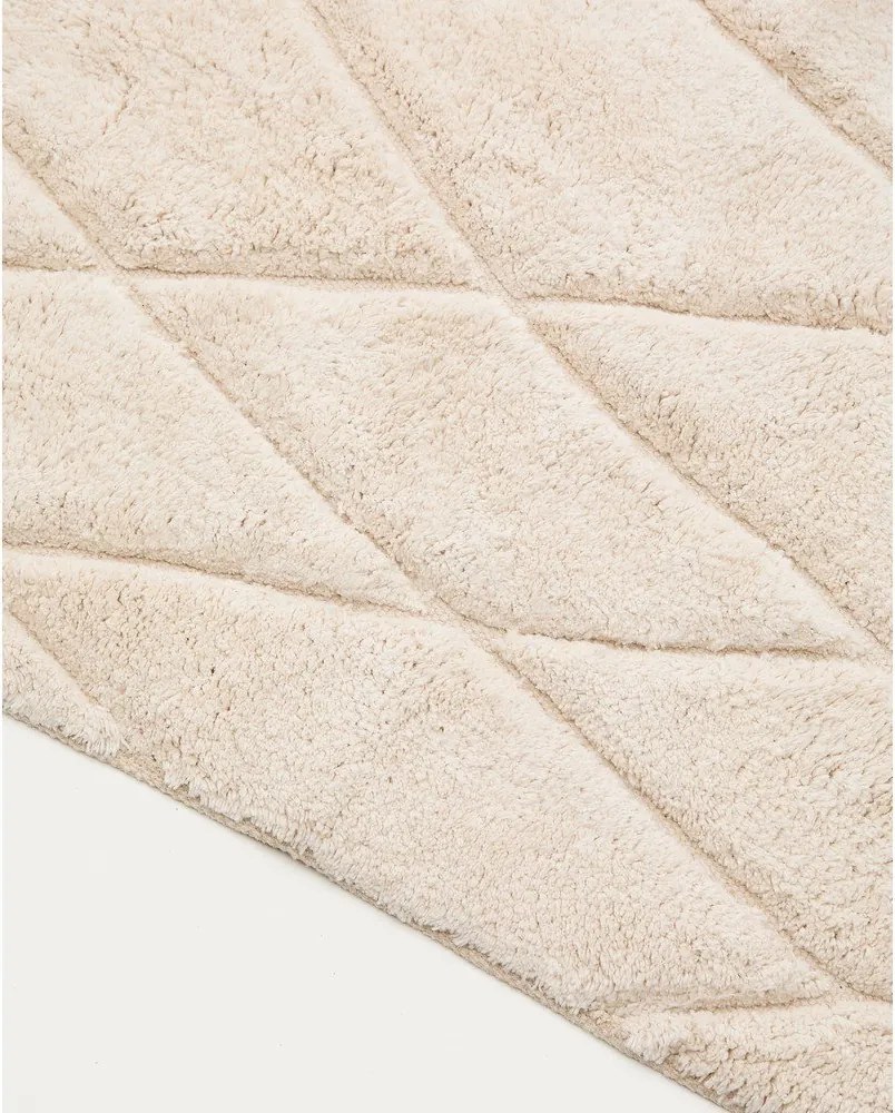 Béžová kúpeľňová predložka 50x70 cm Nyana – Kave Home