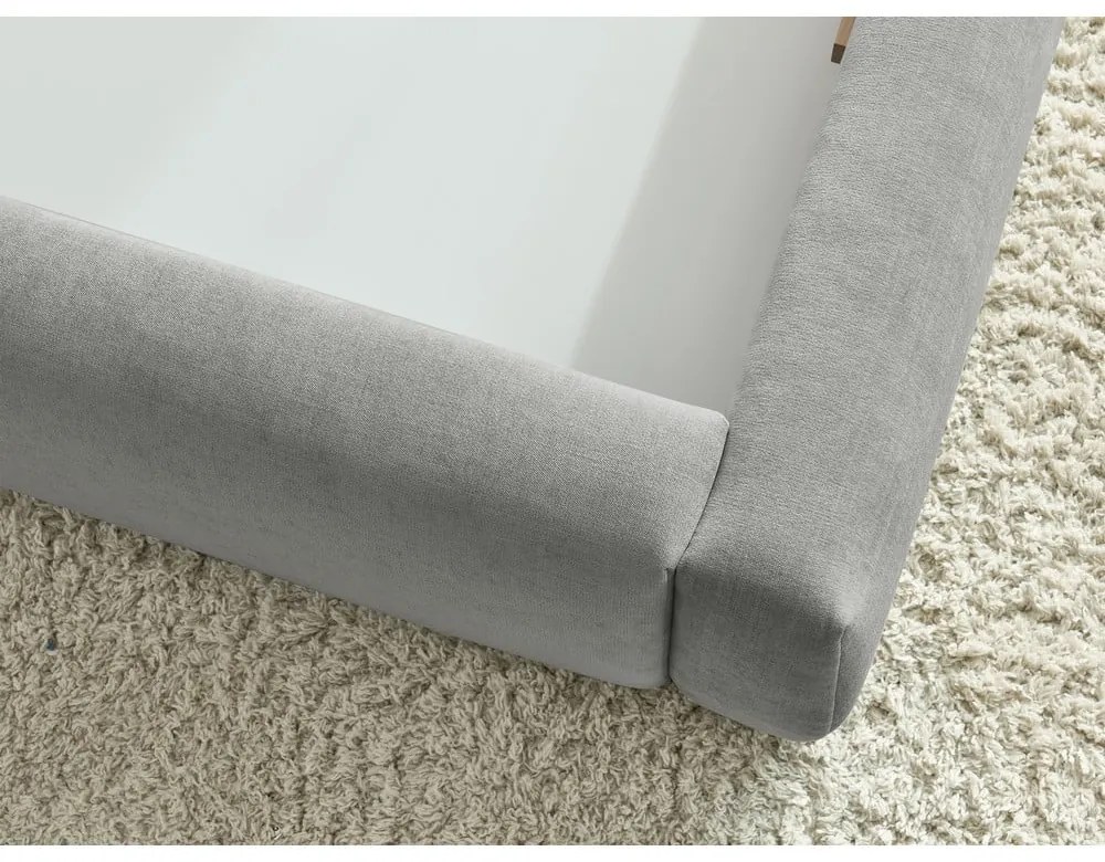 Svetlosivá čalúnená dvojlôžková posteľ s úložným priestorom s roštom 180x200 cm Vernon – Bobochic Paris