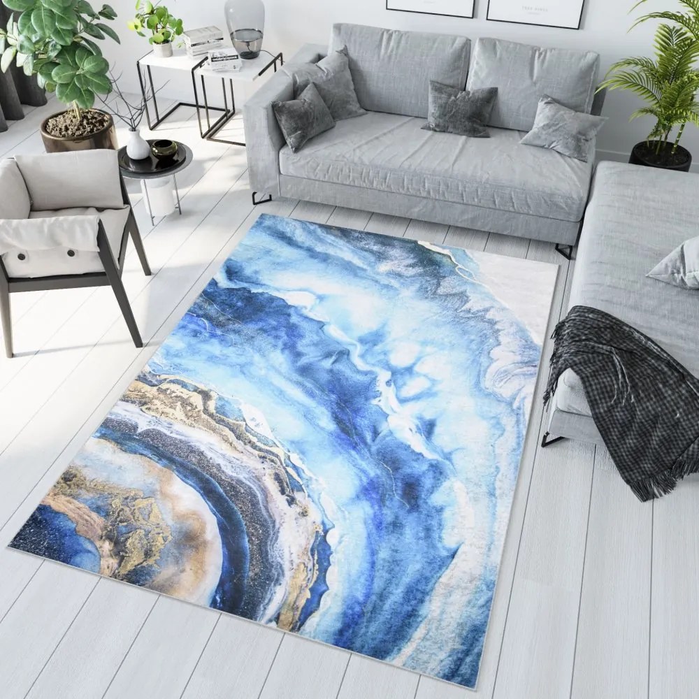 Moderný modrý koberec s abstraktným vzorom Šírka: 120 cm | Dĺžka: 170 cm
