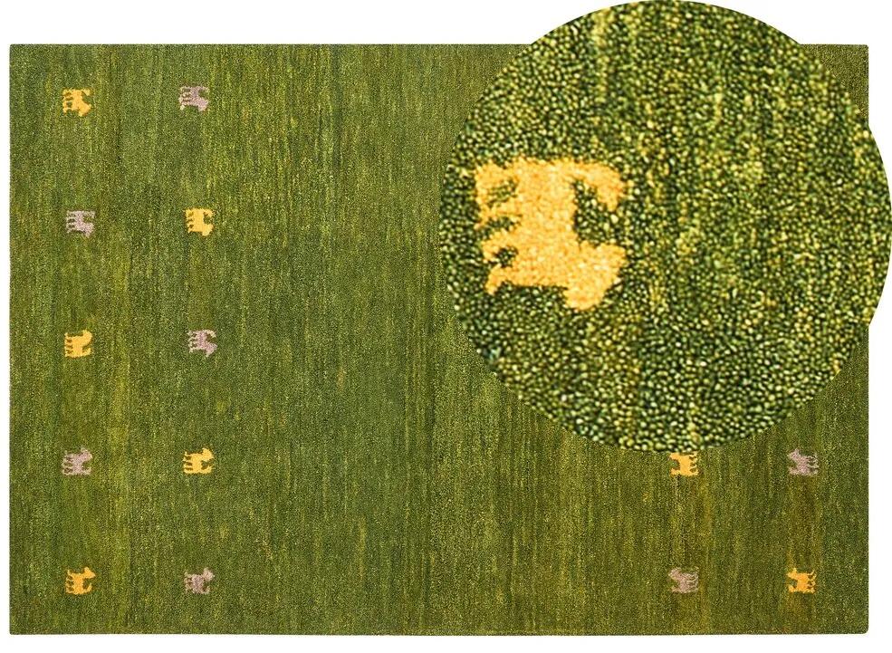 Vlnený koberec gabbeh 140 x 200 cm zelený YULAFI Beliani