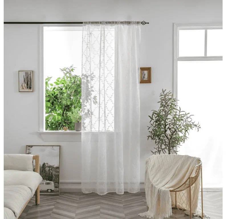 Biely záves VINTORA so vzorom lístkov 140x250 cm Zavesenie: Kovové krúžky