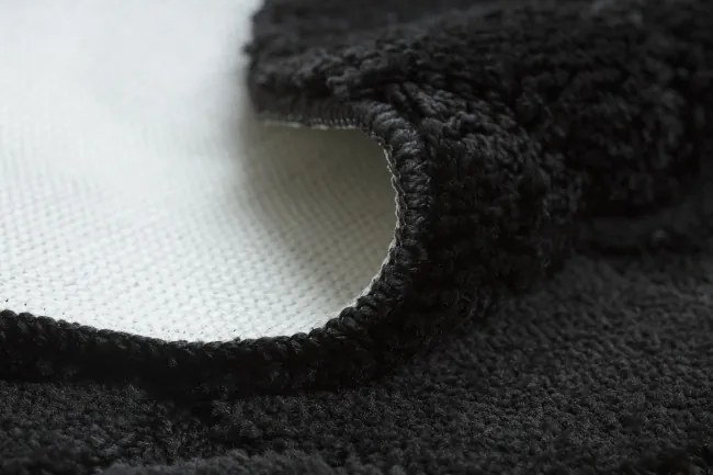 Kúpeľňový koberček SUPREME STONES kamienky, čierny kruh