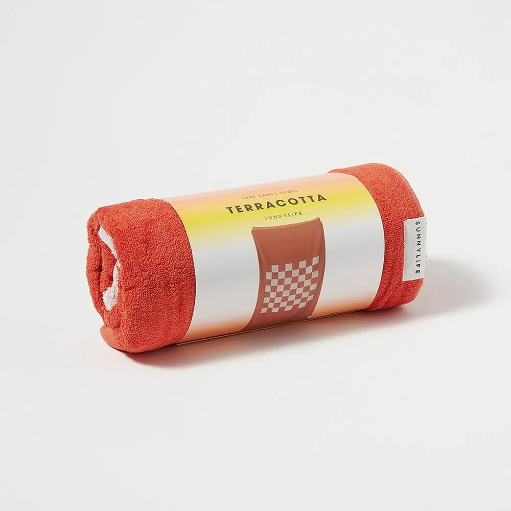 Terakotovooranžová bavlnená plážová osuška Sunnylife Luxe Games, 175 x 90 cm