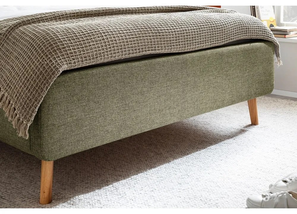 Zelená čalúnená dvojlôžková posteľ s úložným priestorom s roštom 140x200 cm Lotte – Meise Möbel