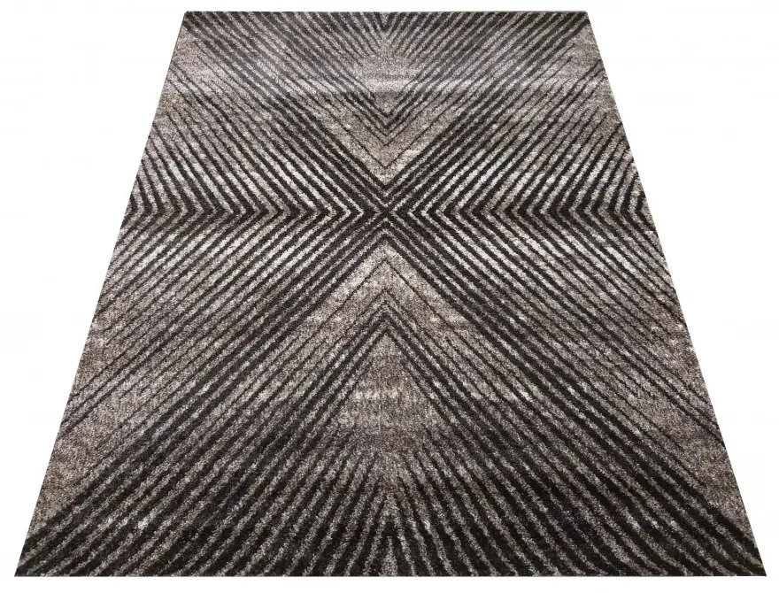 Moderný koberec so zaujímavým geometrickým vzorom opakujúcich sa diagonálnych čiar Šírka: 60 cm | Dĺžka: 100 cm