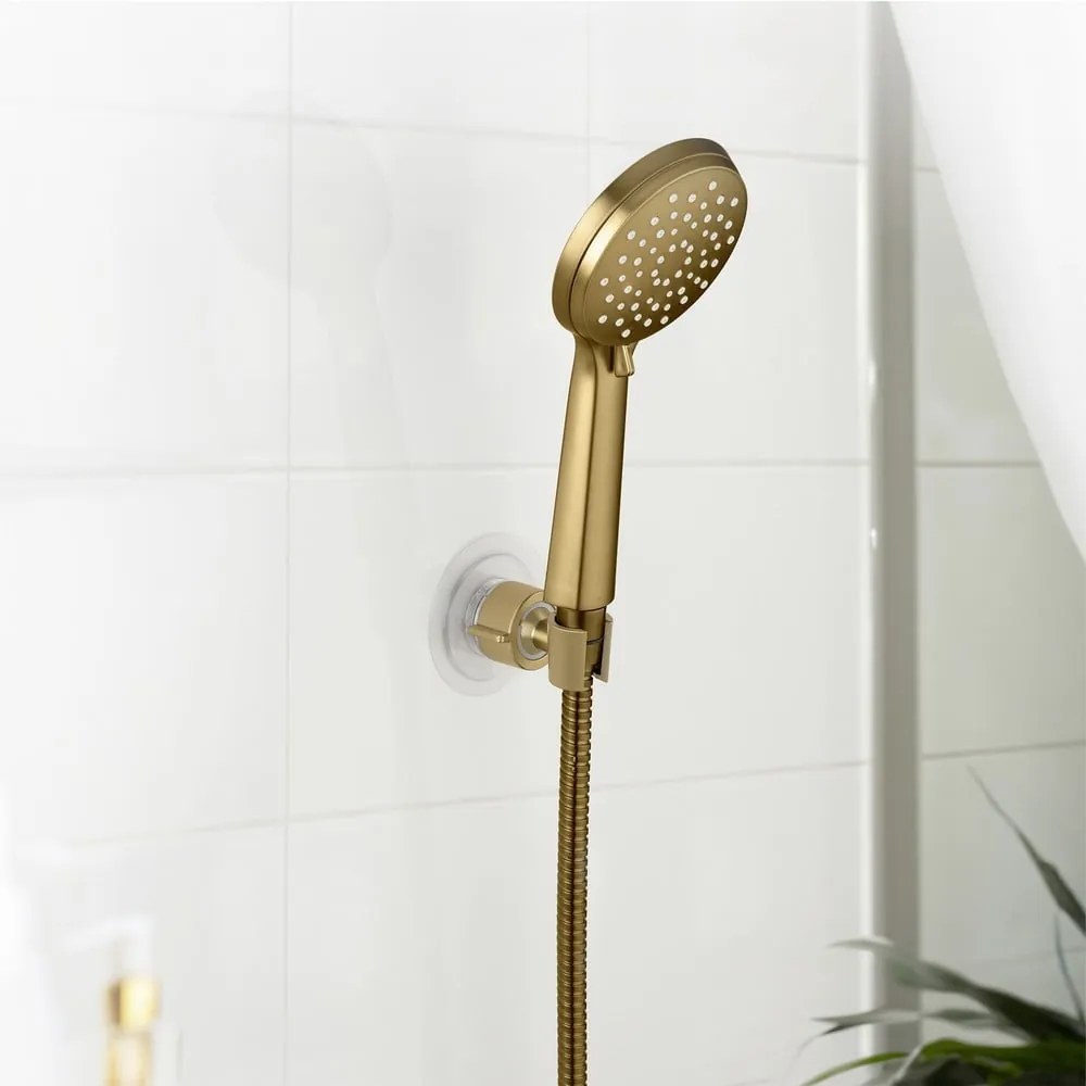 Plastový držiak na sprchu bez vŕtania v zlatej farbe Libertà – Wenko