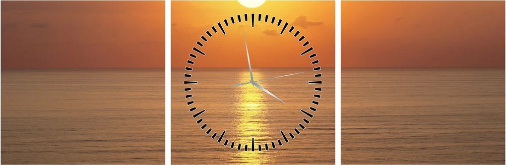Obraz - Západ slnka nad oceánom (s hodinami) (90x30 cm)