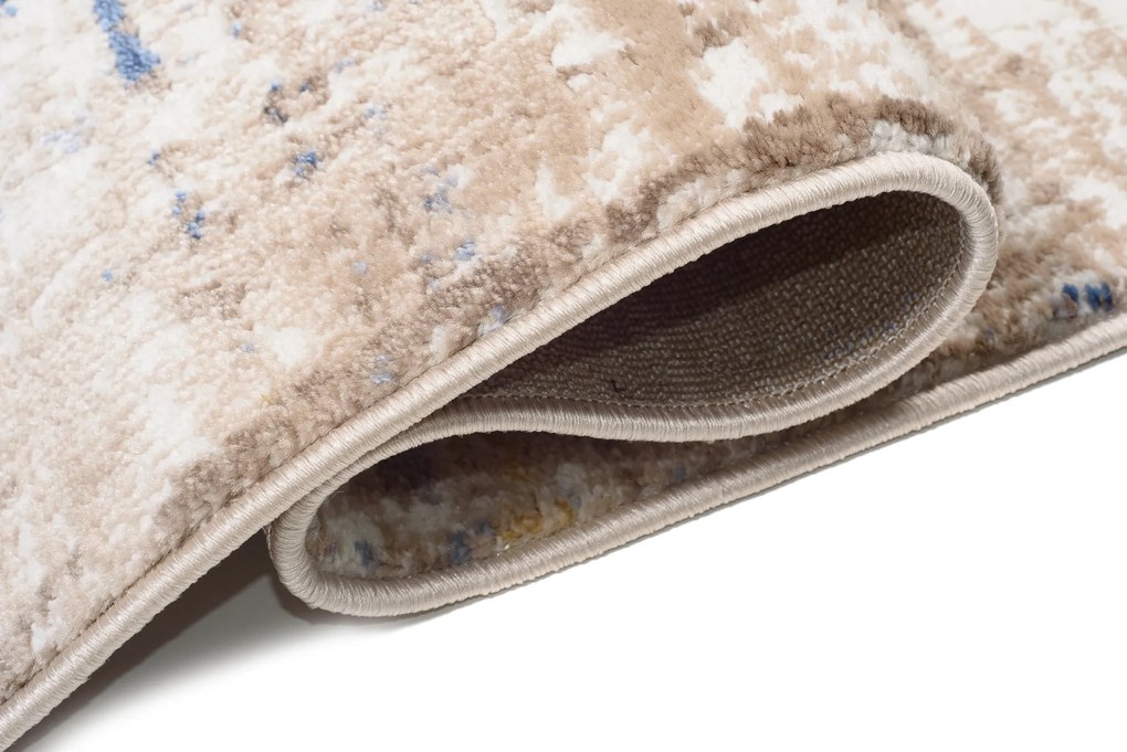 TA Koberec D151M BIELA/TMAVOMODRÁ ASTHANE Rozmer: 180x250 cm