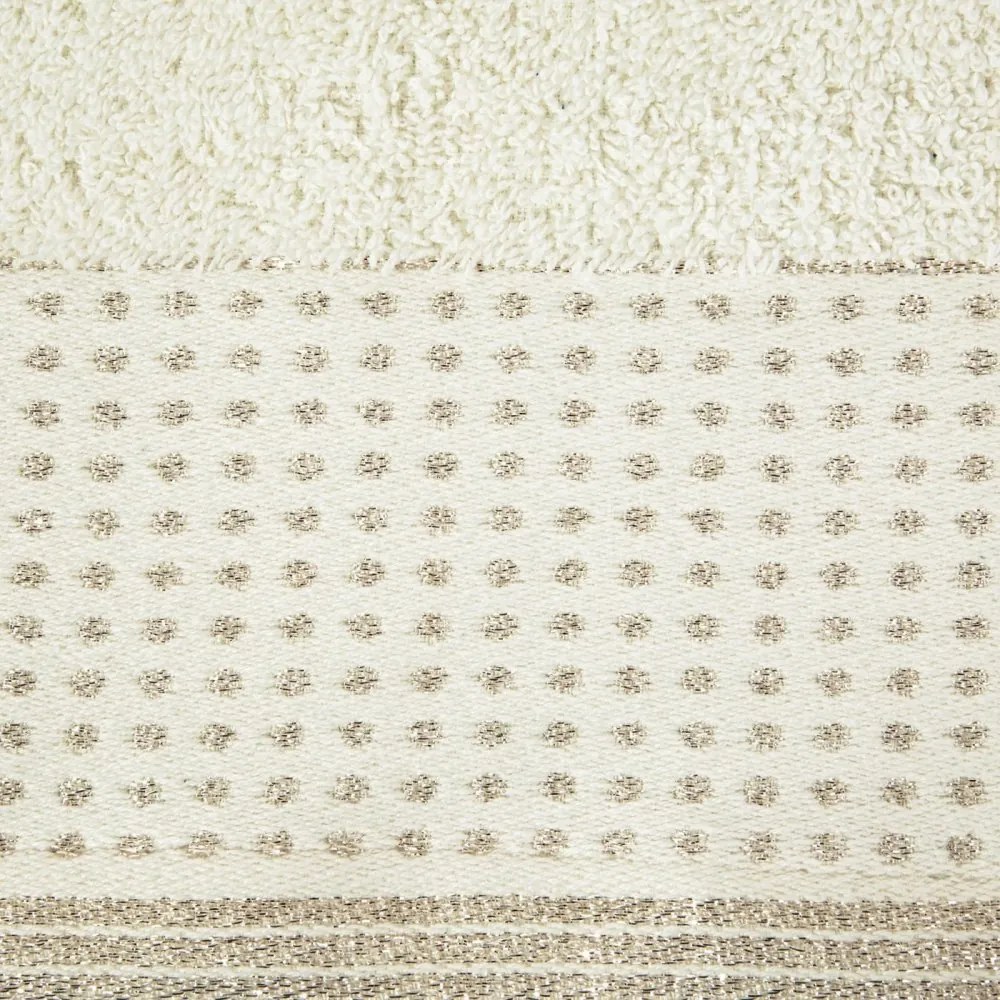 Osuška v béžovej farbe s lemom zvýrazneným bodkami a lesklou lurexovou niťou Šírka: 50 cm | Dĺžka: 90 cm