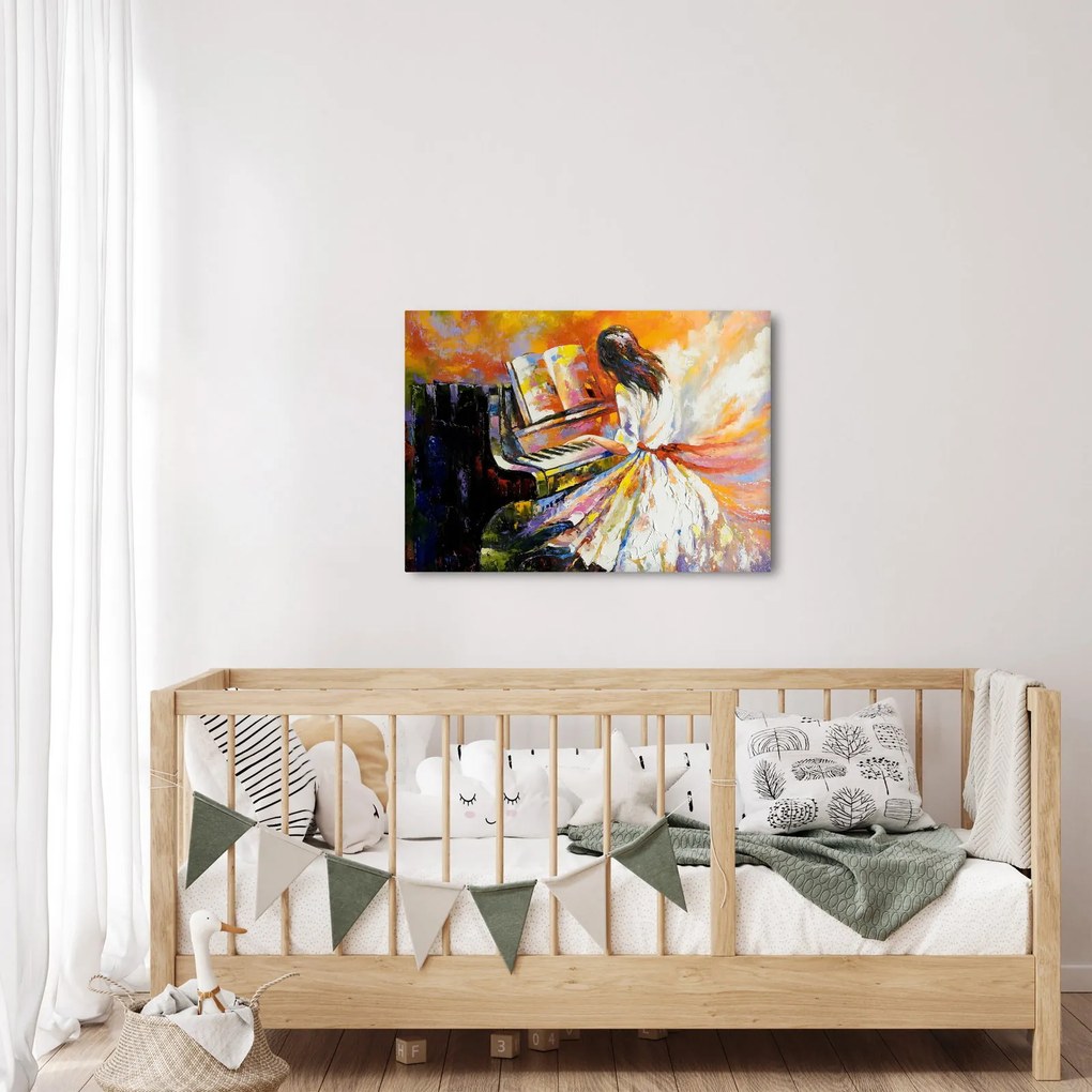 Obraz - Žena hrajúca na piáno (70x50 cm)