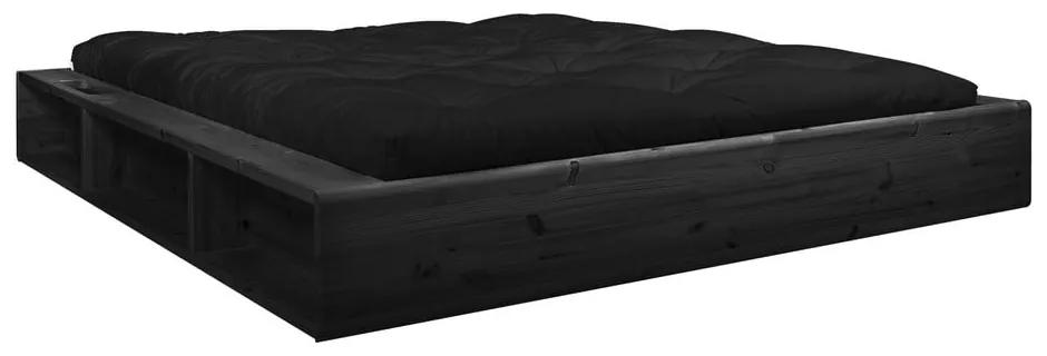 Čierna dvojlôžková posteľ z masívneho dreva s úložným priestorom a čiernym futónom Comfort Karup Design Ziggy, 140 x 200 cm