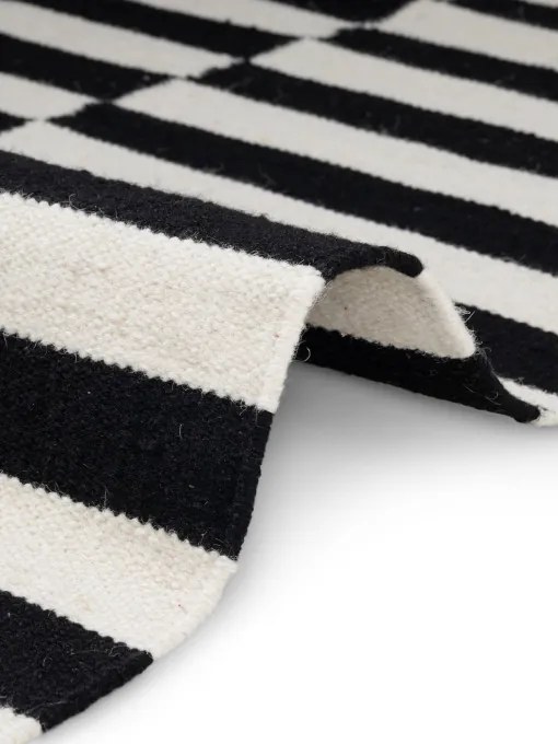 Obojstranný koberec Hanse Home Vika čierny / naturálny / biely