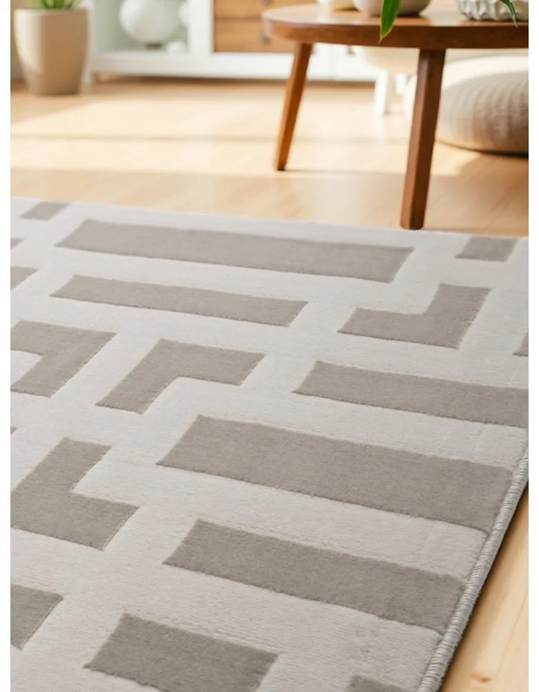 Sivo-krémový behúň 80x240 cm Perles Onyx – Elle Decoration