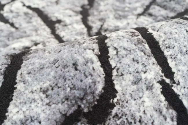 Protišmykový koberec NOVO peň / sivý