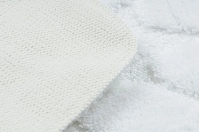 Kúpeľňový koberček SUPREME STONES kamienky, biely