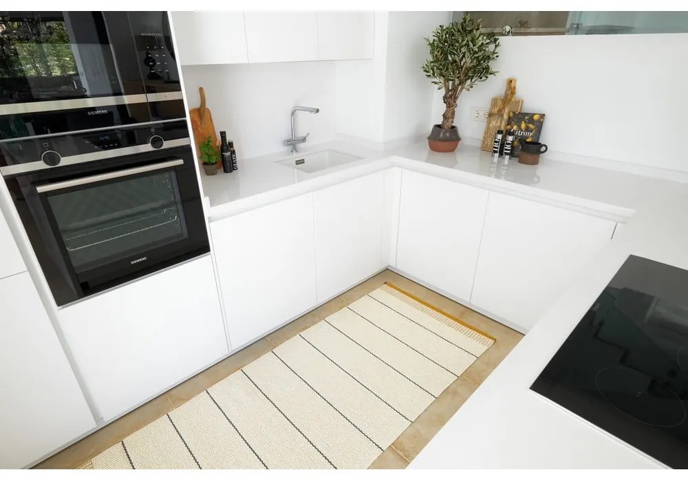 Okrovožlto-krémový vnútorný a vonkajší koberec 60x85 cm Belle Ochre – Pappelina