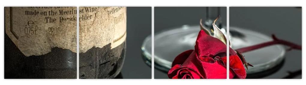 Červená ruža na stole - obrazy do bytu