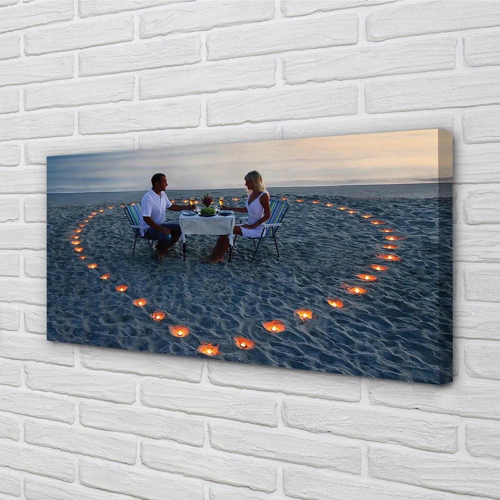 Obraz canvas Srdce s pár sviečok mora 100x50 cm