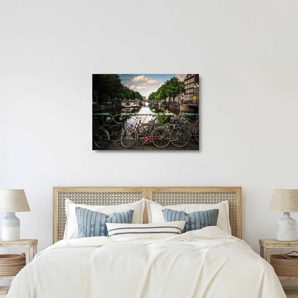 Sklenený obraz bicykla v meste (70x50 cm)