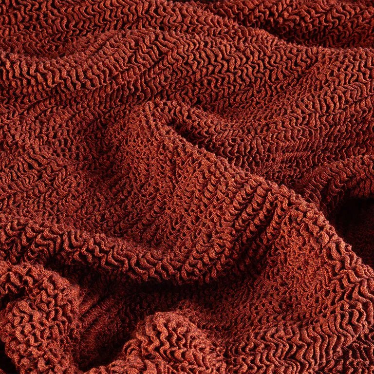 Bielastické poťahy COSTINA medená kreslo ušiak (š. 60 - 110 cm)