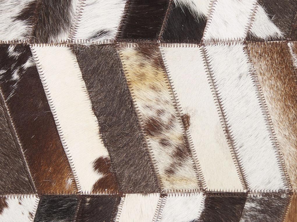 Kožený koberec 160 x 230 cm hnedá/biela AKYELE Beliani
