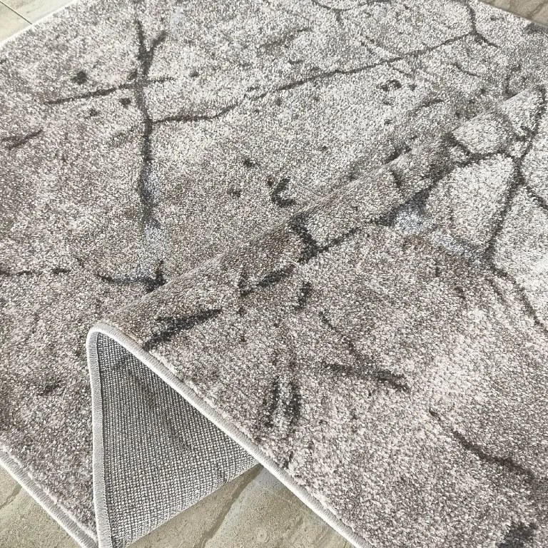 DY Béžový koberec s mramorovým vzorom Panamero 25 Rozmer: 200x290 cm