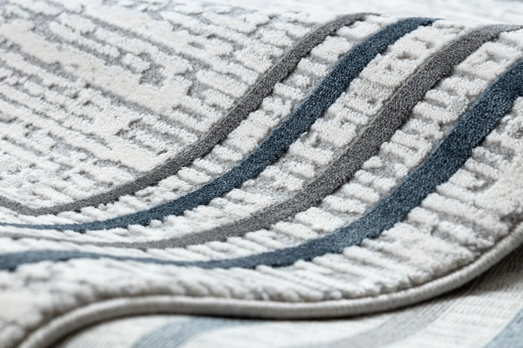 Koberec TULS 51242 s rámikom, slonovinová modrá