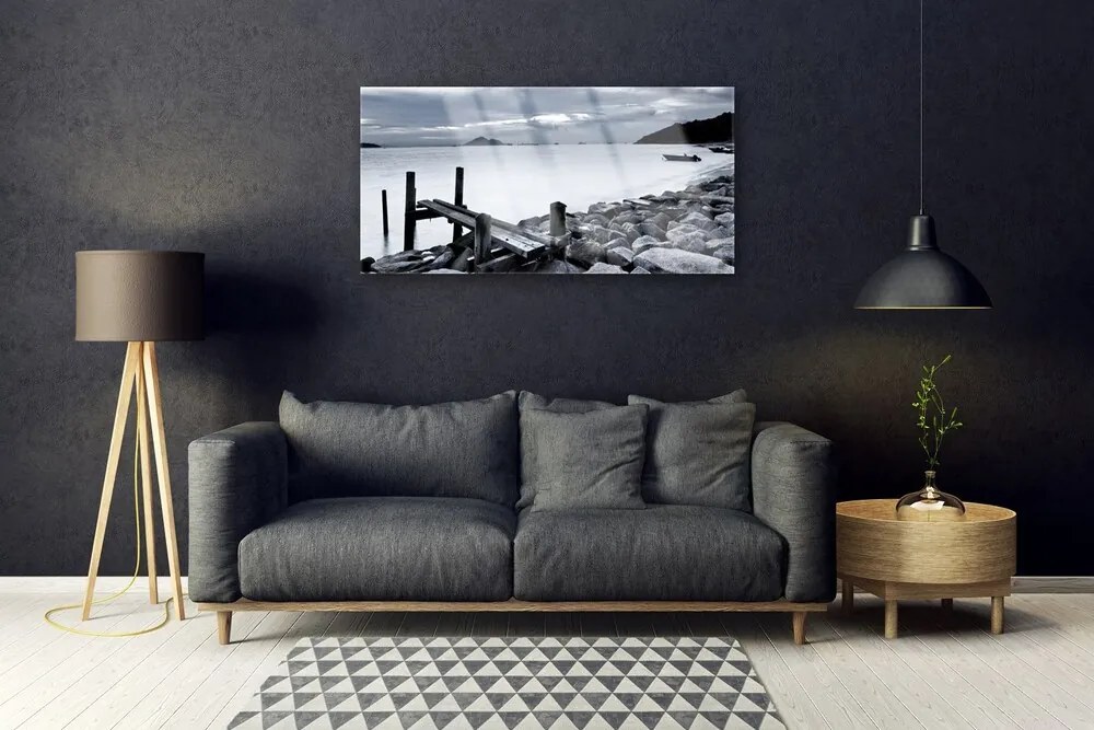 Obraz na skle Pláž kamene krajina 140x70 cm