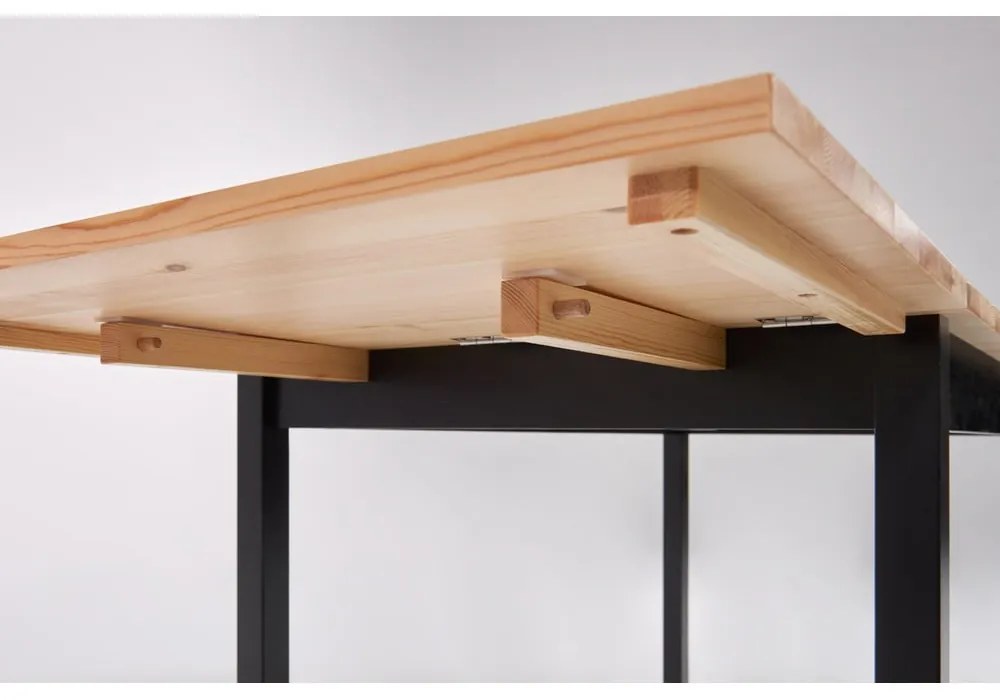 Borovicový rozkladací jedálenský stôl s čiernou konštrukciou Bonami Essentials Brisbane, 120 (200) x 70 cm