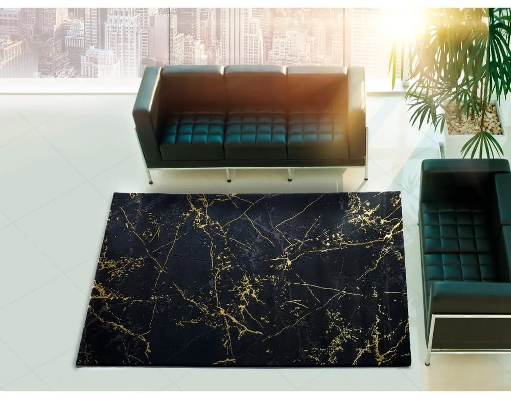 Čierny koberec Universal Gold Marble, 140 x 200 cm