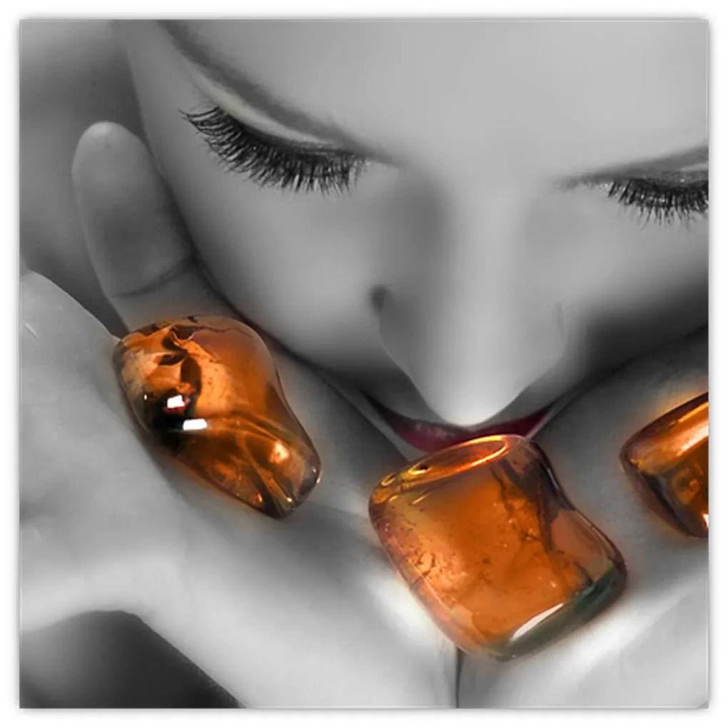 Obraz - oranžové kamene v dlani