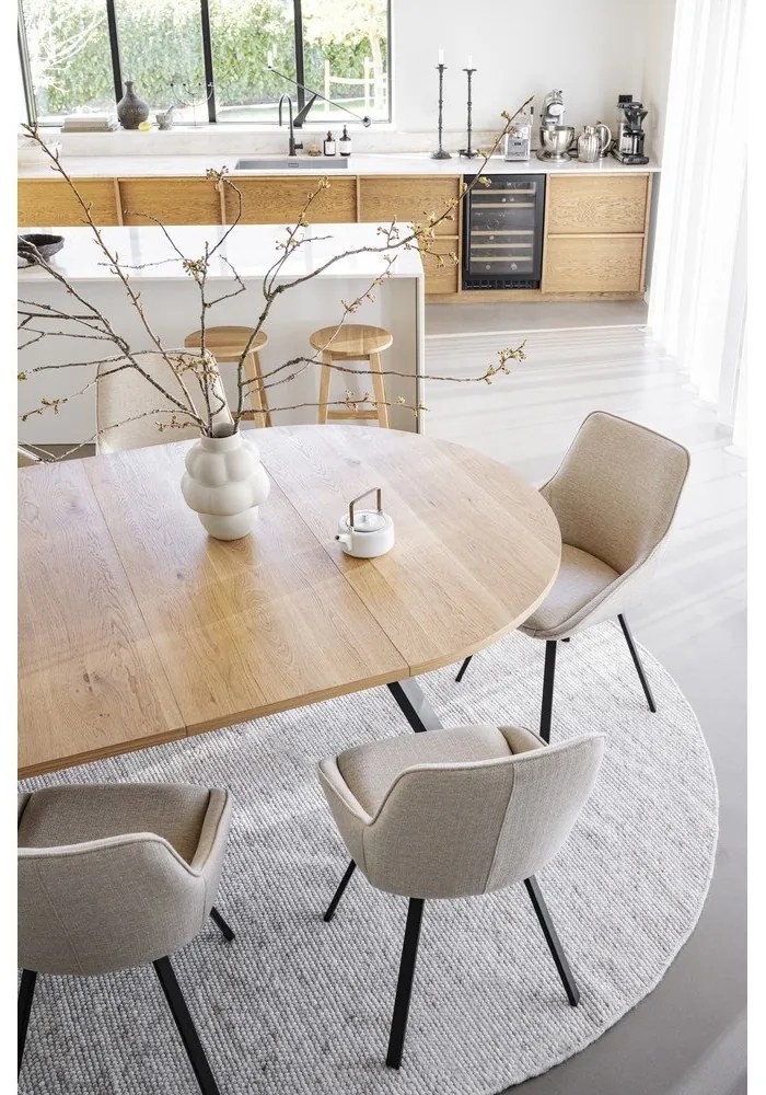 Okrúhly rozkladací jedálenský stôl v dekore duba v prírodnej farbe ø 135 cm Maddock – Rowico