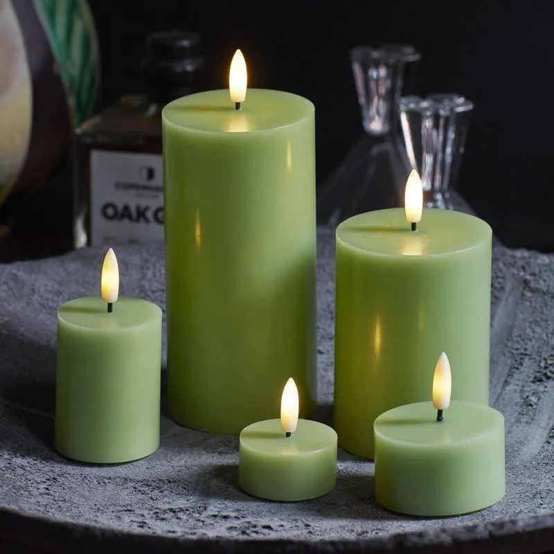 SIRIUS LED vosková sviečka Sille, jablkovo zelená, 7,5 x 12,5 cm