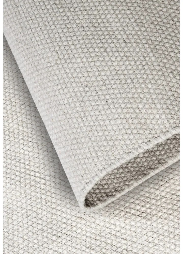 Krémovobiely ručne tkaný koberec s prímesou vlny 190x280 cm Pradesh Natural White – Elle Decoration