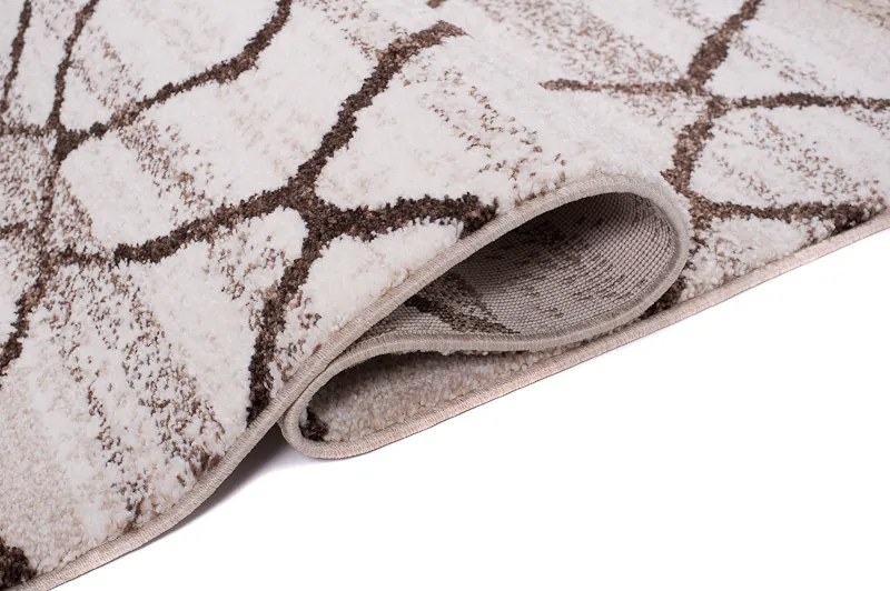 TA Koberec H072A BIELE SARI BRH Rozmer: 140x190 cm