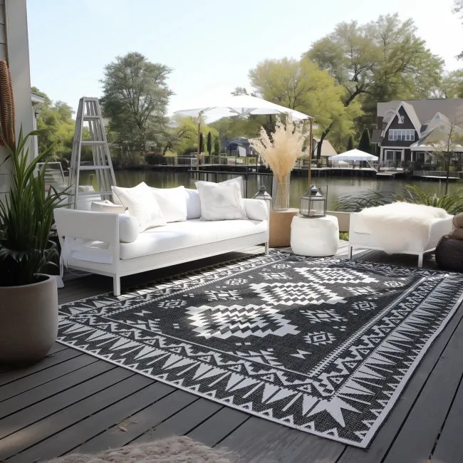 Obojstranný koberec Elle Decoration GEMINI Dynamic čierny