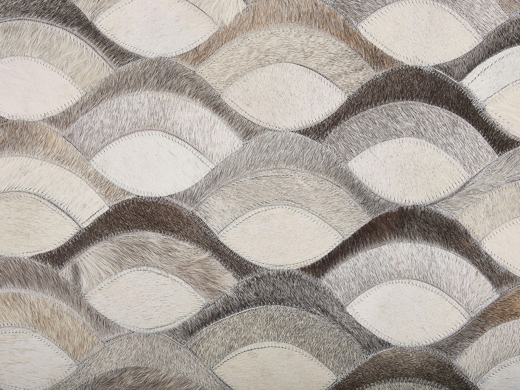 Kožený koberec 160 x 230 cm hnedá/béžová KIRCA Beliani